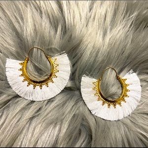 Gold and white earrings